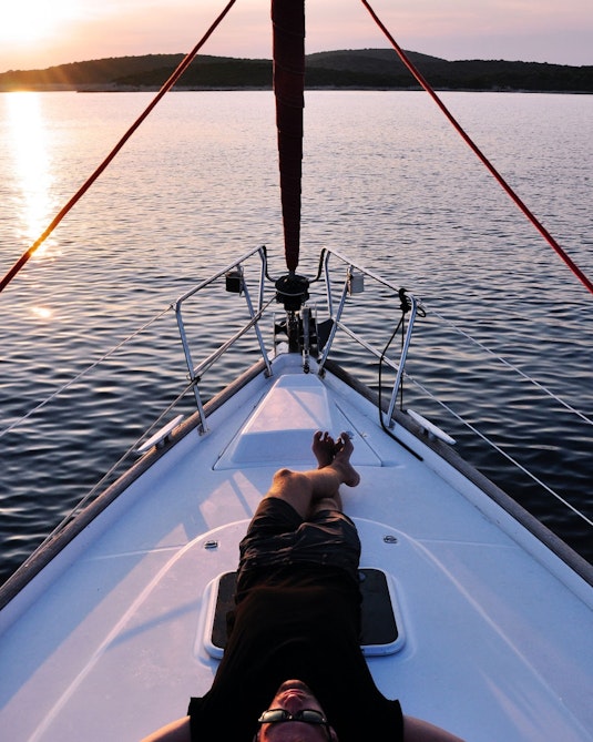 On board a sailboat at sunset
