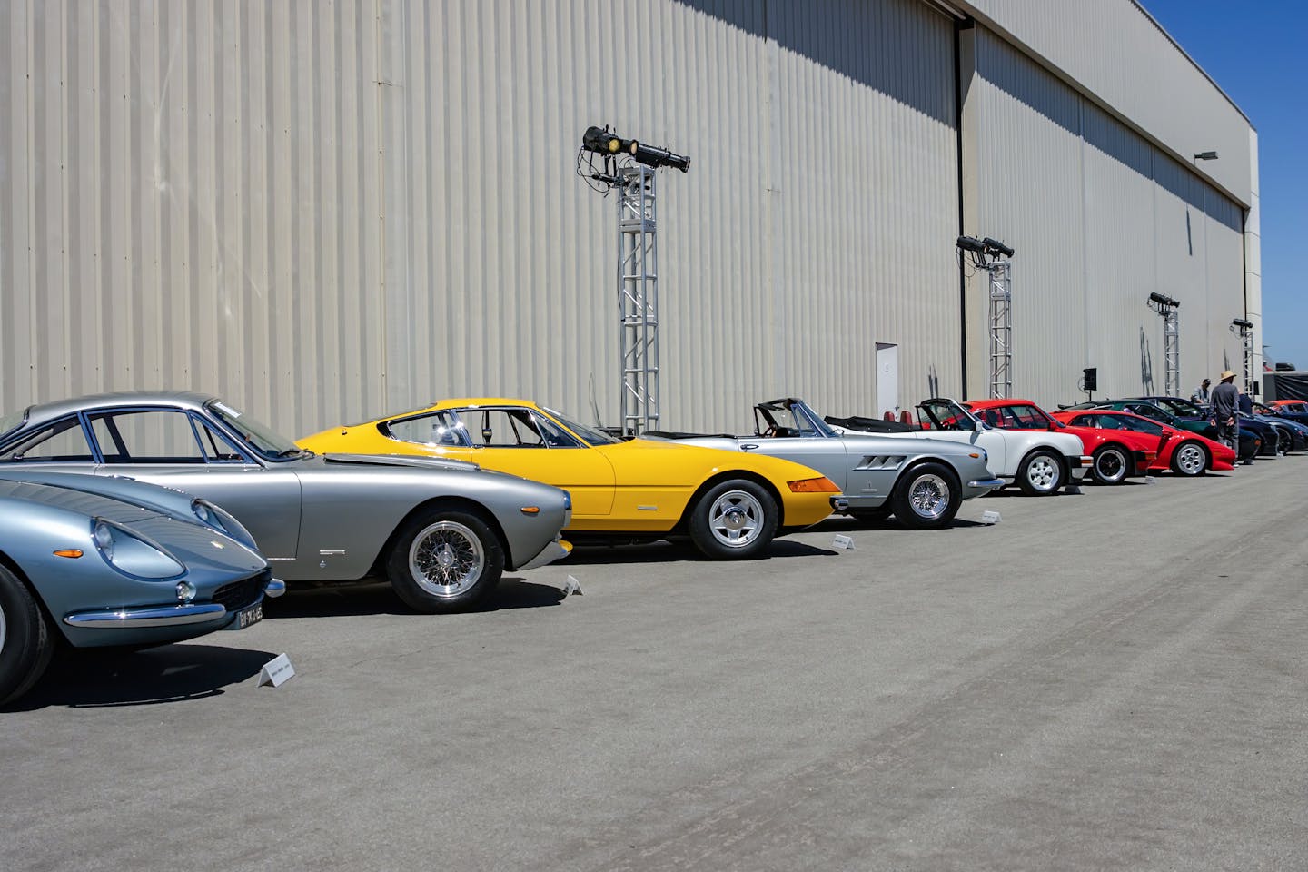 Classic and collector cars lined up at a car show, Monterey Car Week.