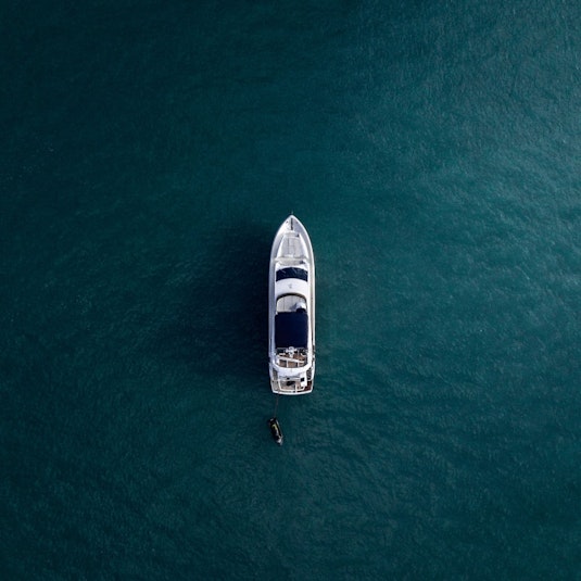 An overhead view of a yacht on the water