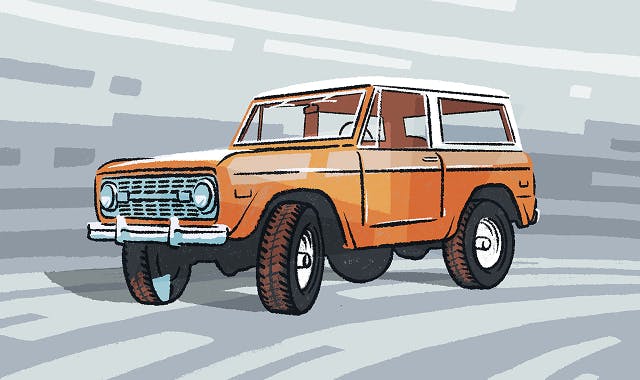 An orange 4 door Bronco style suv with a white roof and back windows
