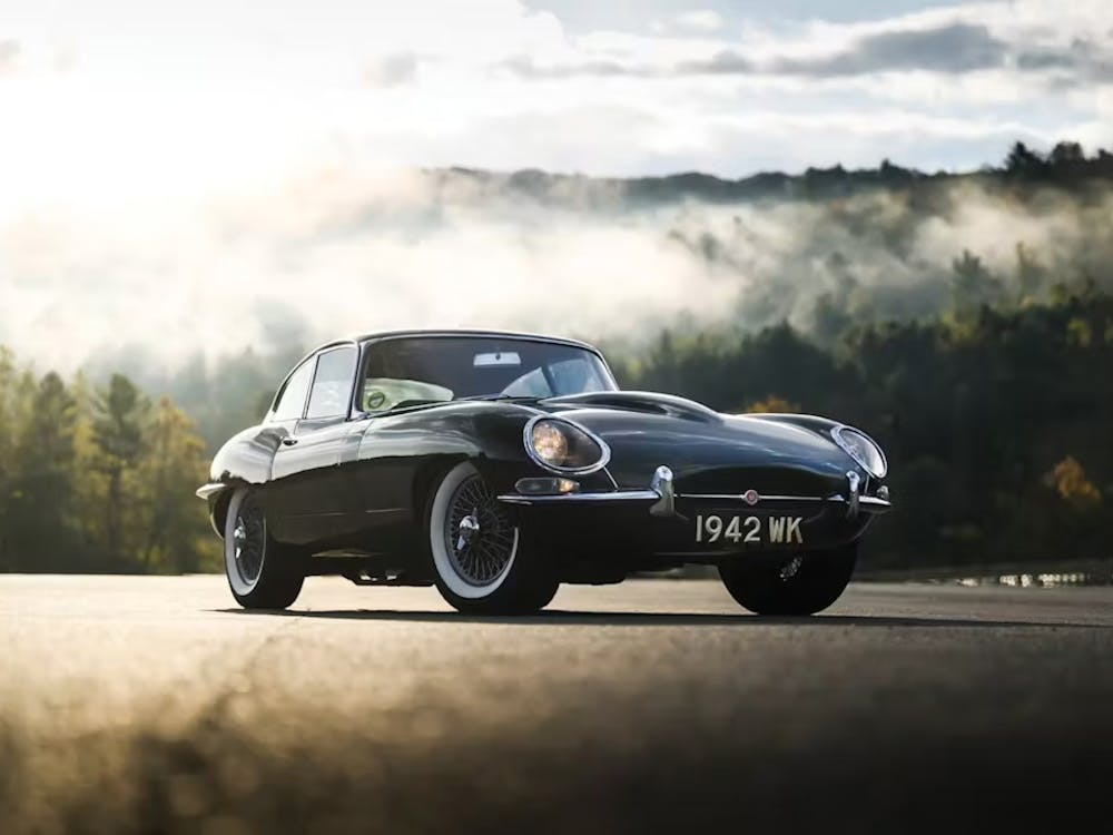 A black classic Jaguar sports car
