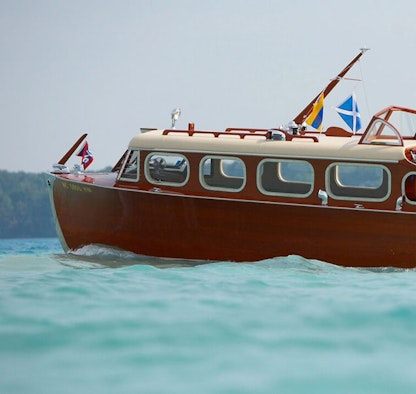 A classic wooden tugboat