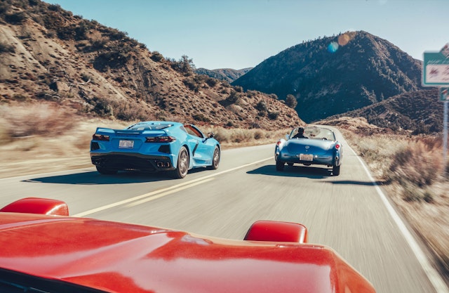 Corvettes driving on a desert road